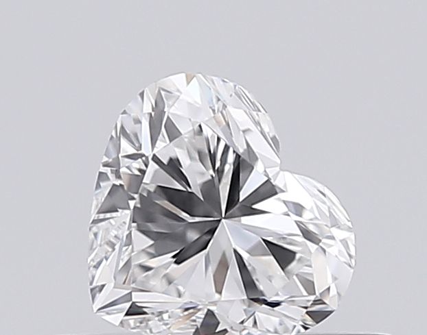 Heart-shaped natural diamond with brilliant cut, showcasing fire and sparkle against neutral background
