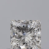 Radiant cut diamond with brilliant facets, showcasing clarity and sparkle against neutral background